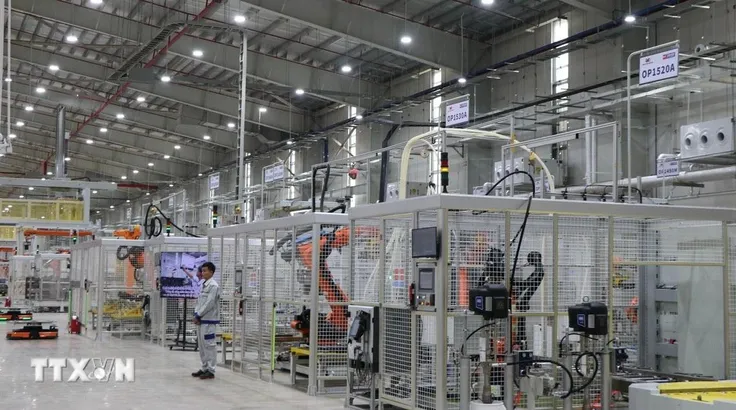 Dây chuyền sản xuất động cơ của Công ty Kim Long Motor Huế. (Ảnh: Nguyên Lý/TTXVN) 