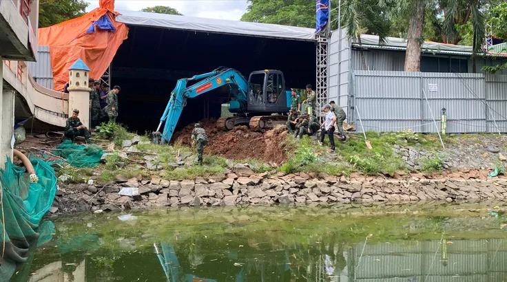 Di dời bia tưởng niệm để mở rộng tìm kiếm hài cốt liệt sĩ tại Công viên Lê Thị Riêng