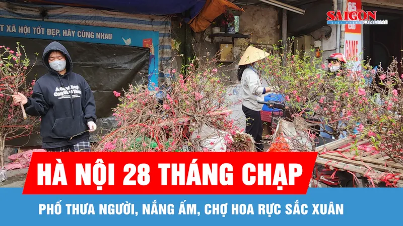 Hà Nội 28 tháng Chạp: Phố thưa người, nắng ấm, chợ hoa rực sắc xuân