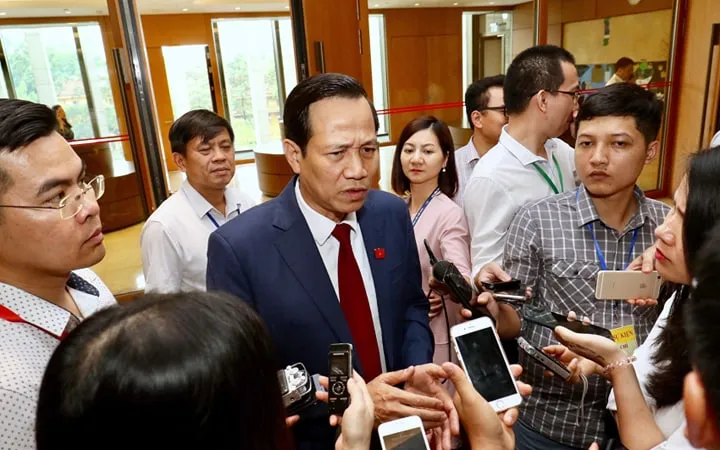 Bộ trưởng Bộ LĐ-TB và XH Đào Ngọc Dung trả lời báo chí sáng 29-5-2019. Ảnh: VIẾT CHUNG