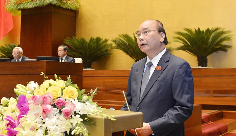 Thủ tướng Nguyễn Xuân Phúc trình bày báo cáo trước Quốc hội, sáng 20-5-2020. Ảnh: QUOCHOI