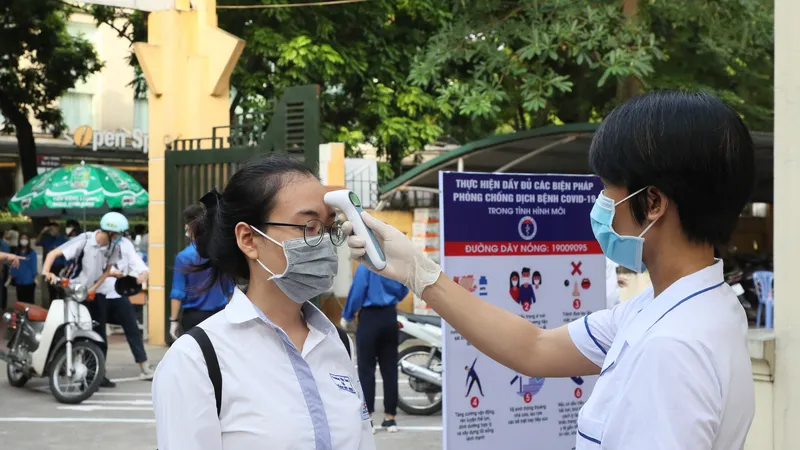 Thí sinh dự thi được phòng dịch kỹ càng. Ảnh: QUANG PHÚC