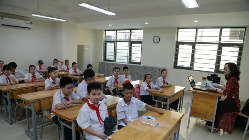 Học sinh lớp 5, lớp 9 sẽ được học nội dung có điều chỉnh, tinh giản. Ảnh: QUANG PHÚC