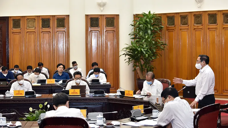 Thủ tướng Chính phủ Phạm Minh Chính chủ trì cuộc họp về phòng, chống dịch bệnh Covid-19. Ảnh: VIẾT CHUNG