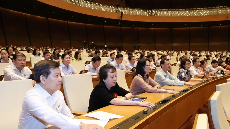 Đại biểu Quốc hội biểu quyết thông qua luật chiều 22-6. Ảnh: QUANG PHÚC