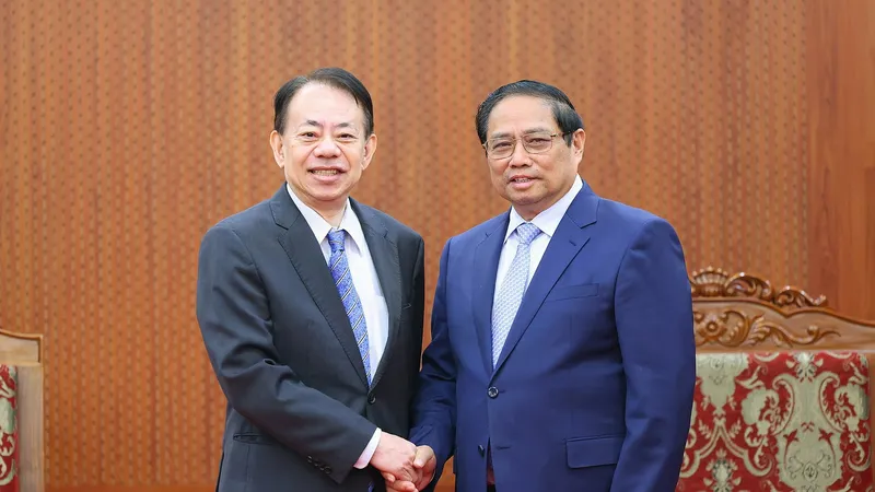 Thủ tướng Phạm Minh Chính tiếp Chủ tịch Ngân hàng Phát triển châu Á (ADB) Masatsugu Asakawa, chiều 13-3. Ảnh: VIẾT CHUNG