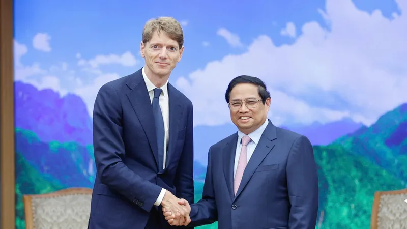 Thủ tướng Phạm Minh Chính tiếp ông Robert Maersk Uggla, Chủ tịch APM Holding kiêm Chủ tịch Maersk, chiều 23-9. Ảnh: VIẾT CHUNG