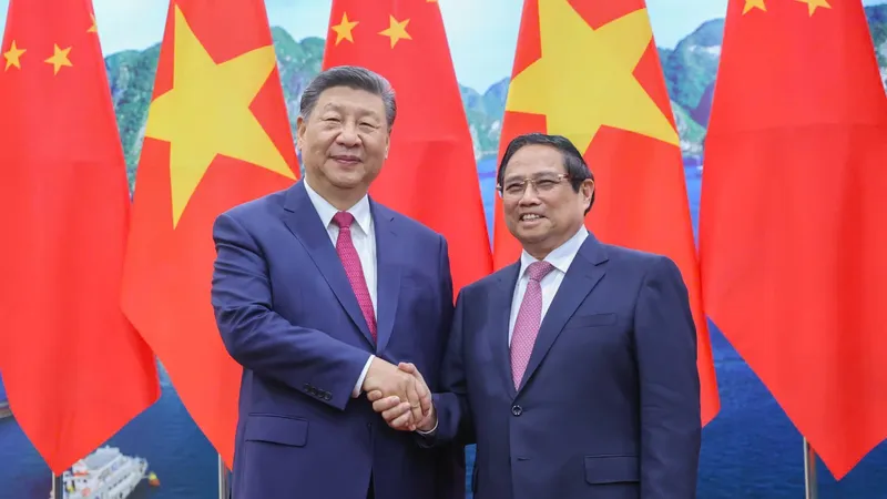 Thủ tướng Phạm Minh Chính và Tổng Bí thư, Chủ tịch nước Trung Quốc Tập Cận Bình, chiều 14-4. Ảnh: VIẾT CHUNG