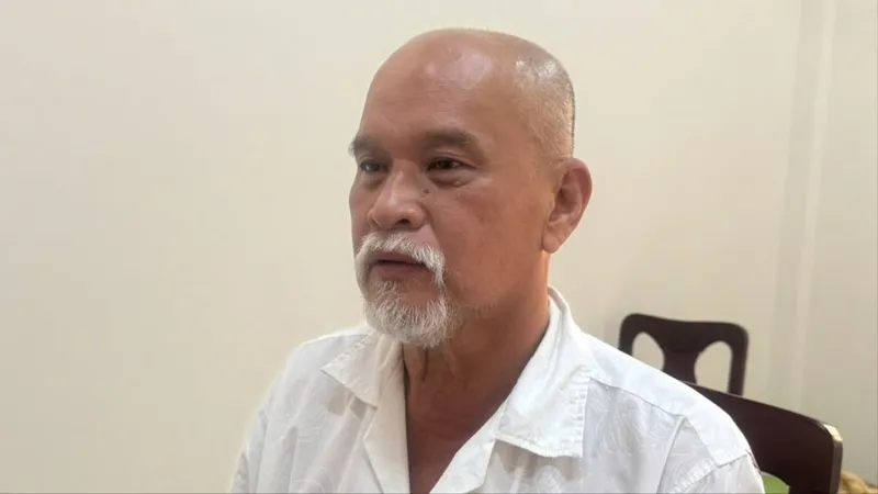 Trần Văn Hiếu Minh tại cơ quan công an.