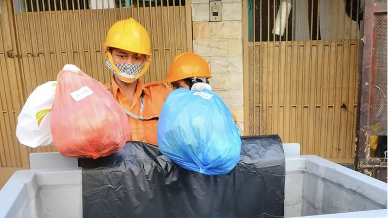 Quận 7 triển khai thí điểm thu phí thu gom rác qua phần mềm