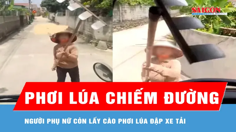 Người phụ nữ phơi lúa lấn đường, còn vác cào đập xe tải