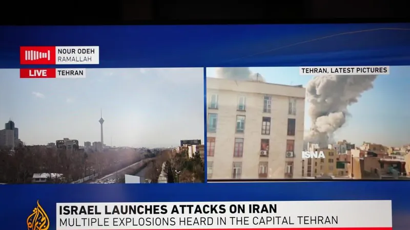 Kênh Al Jazeera đưa thông tin về vụ tấn công của Israel nhằm vào Iran. Ảnh: XINHUA/AL JAZEERA