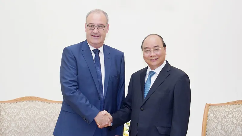 Thủ tướng tiếp Ủy viên Hội đồng Liên bang, Bộ trưởng Kinh tế, Giáo dục và Nghiên cứu Liên bang Thụy Sĩ Guy Parmelin - Ảnh: VGP/Quang Hiếu