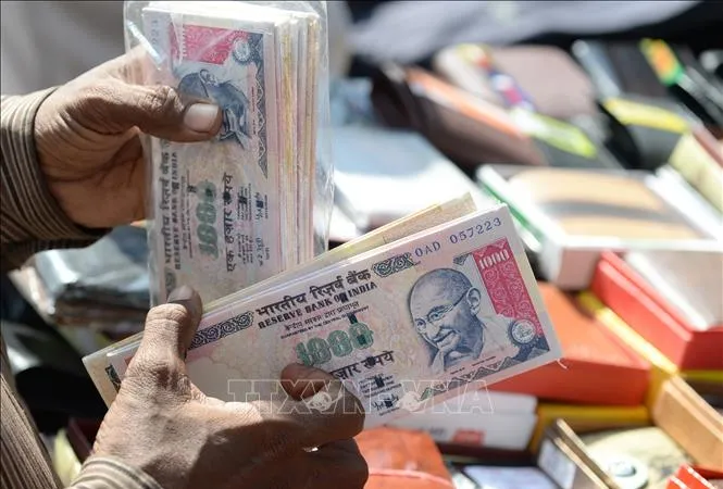 Đồng rupee của Ấn Độ. Ảnh: AFP/TTXVN