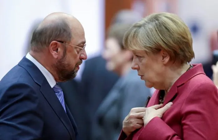 Chủ tịch Đảng Dân chủ Xã hội Đức (SPD)Martin Schulz (trái) và bà Merkel. Ảnh: POLITICO