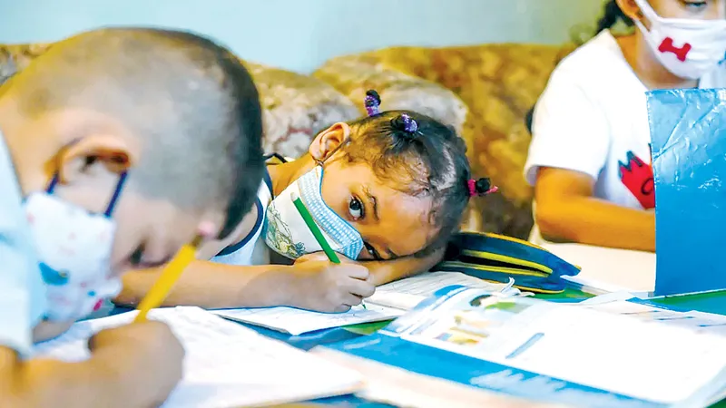 Trẻ em tham gia lớp học ở khu phố Petare, thủ đô Caracas, Venezuela. Ảnh: UNICEF