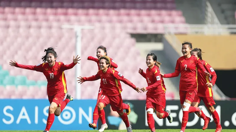 Các tuyển thủ bóng đá nữ Việt Nam vui mừng sau khi đoạt vé dự vòng chung kết World Cup nữ 2023