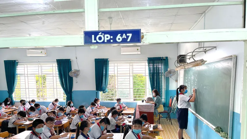 Học sinh lớp 6 Trường THCS Sương Nguyệt Anh (phường 5, quận 8, TPHCM). Ảnh: HOÀNG HÙNG