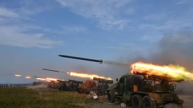 Lực lượng pháo binh Triều Tiên trong cuộc diễn tập ngày 6-10. Ảnh: KCNA