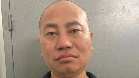 Nguyễn Minh Phúc tại cơ quan công an 