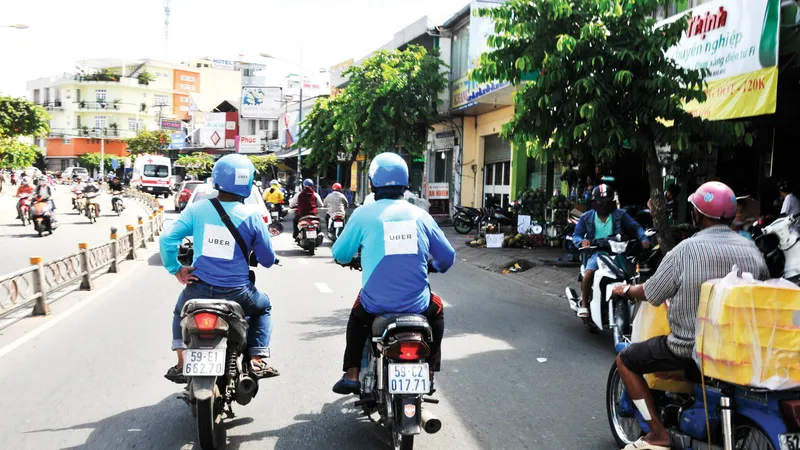 Uber hoạt động tại TPHCM Ảnh: THÀNH TRÍ