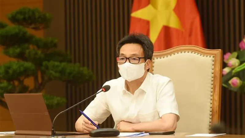  Phó Thủ tướng Chính phủ Vũ Đức Đam, Trưởng Ban Chỉ đạo Quốc gia phòng, chống dịch COVID-19, chủ trì cuộc họp trực tuyến. Ảnh: TTXVN