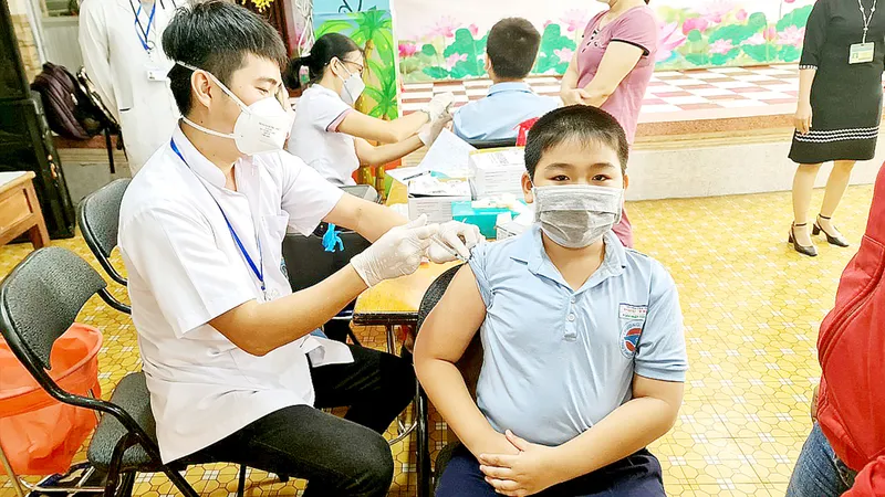 Tiêm vaccine Covid-19 cho trẻ từ 5 đến dưới 12 tuổi tại TPHCM. Ảnh: THÀNH SƠN