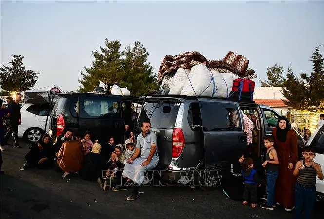 Người dân sơ tán từ Liban nghỉ tạm tại khu vực cửa khẩu biên giới Jdeidat Yabous với Syria ngày 24-9-2024. Ảnh minh họa: THX/TTXVN 