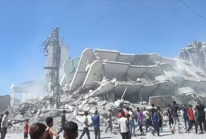 Tòa nhà bị phá hủy sau cuộc không kích của Israel xuống Dải Gaza. Ảnh: IRNA