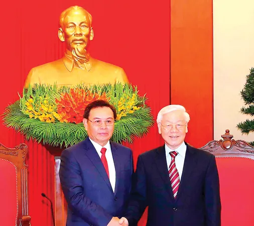 Tổng Bí thư Nguyễn Phú Trọng tiếp đồng chí Saysomphone Phomvihane, Ủy viên Bộ Chính trị, Chủ tịch Ủy ban Trung ương Mặt trận Lào xây dựng đất nước