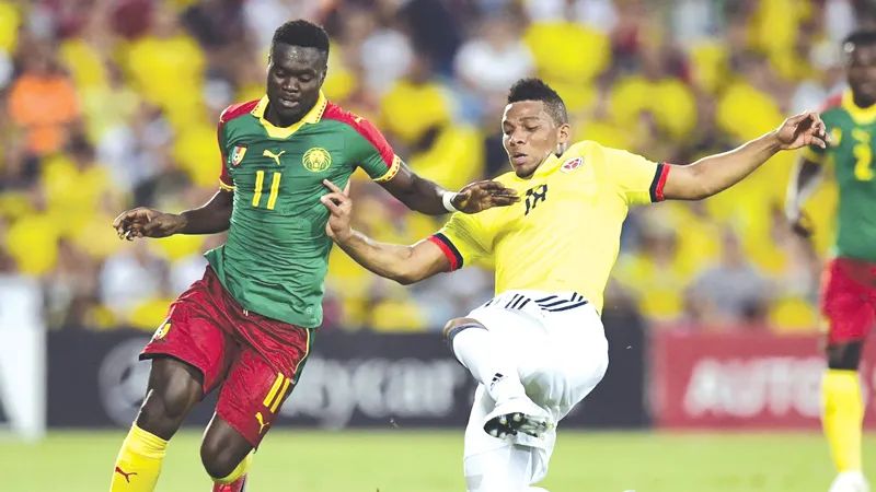 Cameroon (trái) là ẩn số khó lường nhất tại bảng B mà Chile cần giải mã.