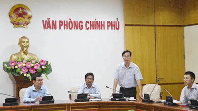 Ông Đỗ Ngọc Huỳnh (đứng) phát biểu trong một buổi lễ năm 2015. Ảnh: VGP