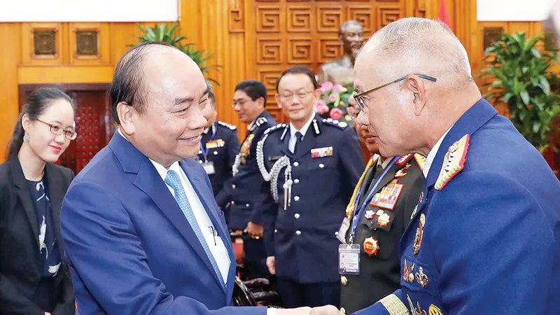 Thủ tướng tiếp các Trưởng đoàn dự Hội nghị Tư lệnh Cảnh sát các nước ASEAN lần thứ 39 tại Việt Nam. Ảnh: TTXVN
