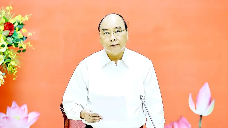 Chủ tịch nước Nguyễn Xuân Phúc phát biểu tại phiên họp thứ ba Hội đồng Quốc phòng và An ninh nhiệm kỳ 2016-2021. Ảnh: TTXVN