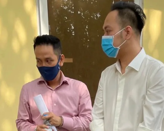 Hai bị can Nguyễn Nam Huy (phải) và Nguyễn Nam Thái