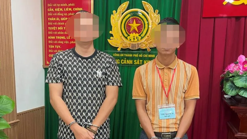 Linh và Nghĩa tại cơ quan công an