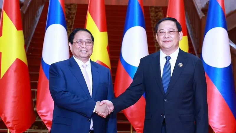 Thủ tướng Phạm Minh Chính hội kiến Thủ tướng Lào Sonexay Siphandone. Ảnh: TTXVN