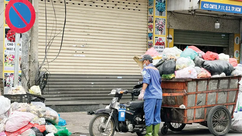 Băn khoăn cân rác tính tiền