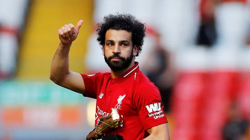 <Mo Salah với giải đồng Vua phá luối Premier League.