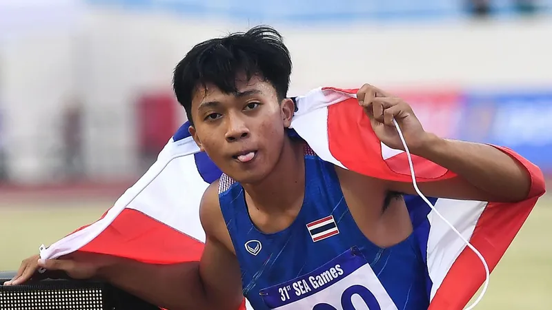 VĐV nước rút tuổi teen Puripol Boonson