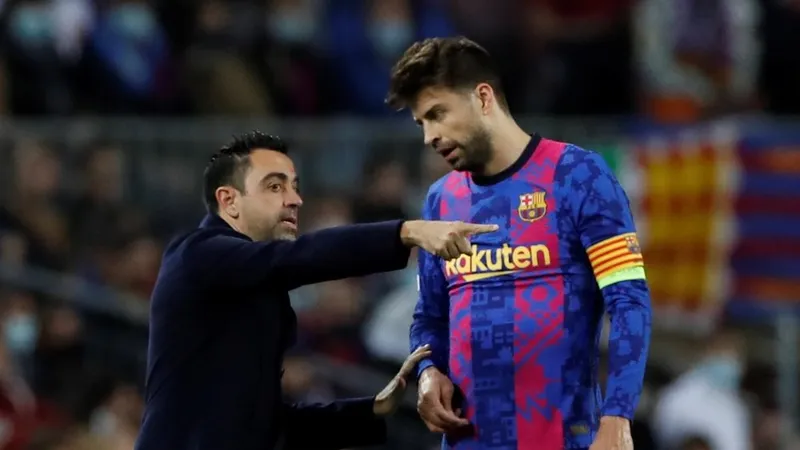 Xavi Hernandez và Gerard Pique