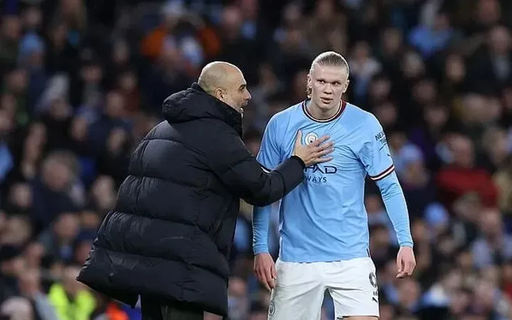Pep Guardiola và Erling Haaland