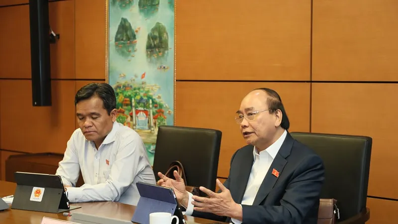 Thủ tướng Chính phủ Nguyễn Xuân Phúc phát biểu tại phiên thảo luận tổ chiều 10-11. Ảnh: QUANG PHÚC