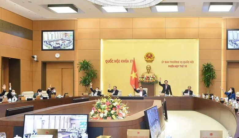 Ủy ban Thường vụ Quốc hội biểu quyết. Ảnh: QH