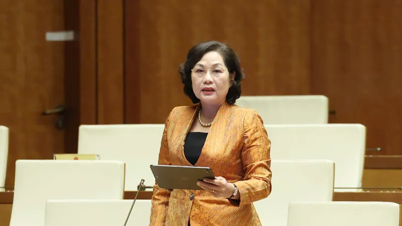 Thống đốc Ngân hàng Nhà nước Nguyễn Thị Hồng "chia lửa" với Bộ trưởng Bộ Tài chính. Ảnh: QUANG PHÚC