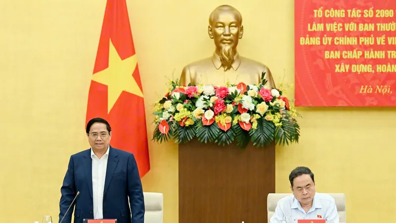 Bí thư Đảng ủy Chính phủ, Thủ tướng Chính phủ Phạm Minh Chính và Bí thư Đảng ủy Quốc hội, Chủ tịch Quốc hội Trần Thanh Mẫn đồng chủ trì hội nghị. Ảnh: VIẾT CHUNG