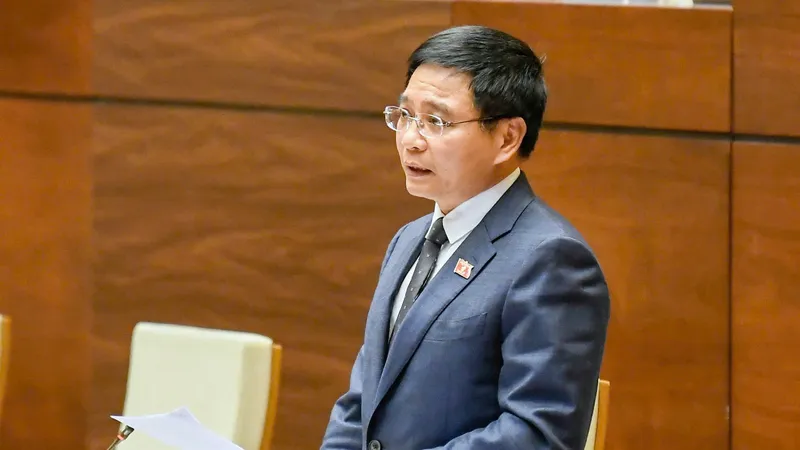 Bộ trưởng Bộ Tài chính Nguyễn Văn Thắng phát biểu giải trình, làm rõ một số vấn đề đại biểu Quốc hội nêu, chiều 9-12. Ảnh: VIẾT CHUNG 
