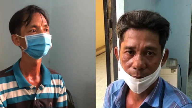 Hai đối tượng Bình và Phú (từ trái qua phải) tại cơ quan công an 