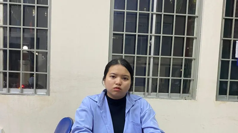 Đối tượng Vy tại cơ quan công an. Ảnh: C.T