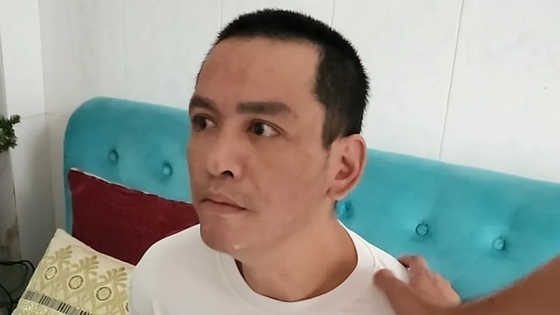 Trí lúc bị bắt. Ảnh: C.T